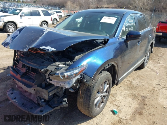2018 Mazda CX-9 Sport with VIN JM3TCBBY8J0212284, listed as a IAAI auction lot 41798637 with 72,449 mi miles and . Bid and sale history available at carsss.com. Image 2.