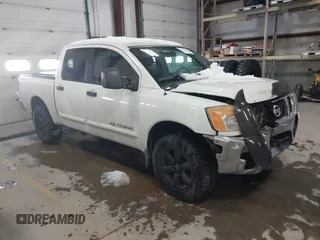 2014 Nissan Titan S with VIN 1N6AA0EC2EN512337, listed as a IAAI auction lot 41337837 with 187,540 mi miles. Bid and sale history available at carsss.com. Image 1.