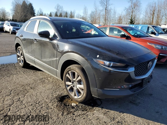 2023 Mazda CX-30 S Select with VIN 3MVDMBBM9PM524187, listed as a Copart auction lot 46709355 with 25,244 mi miles and Salvage Title. Bid and sale history available at DreamBid. Image 4.