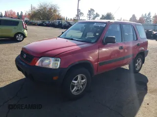 1999 Honda CR-V LX with VIN JHLRD2843XC014579, listed as a Copart auction lot 79394924 with 249,544 mi miles and Salvage Title. Bid and sale history available at carsss.com. Image 1.