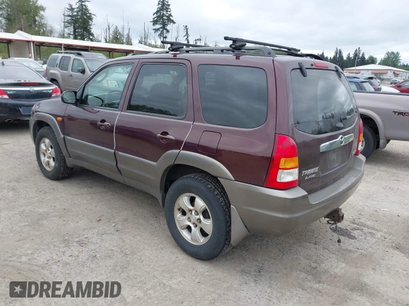 2001 Mazda Tribute LX with VIN 4F2CU08141KM10269, listed as a IAAI auction lot 42138704 with 166,825 mi miles and . Bid and sale history available at carsss.com. Image 3.