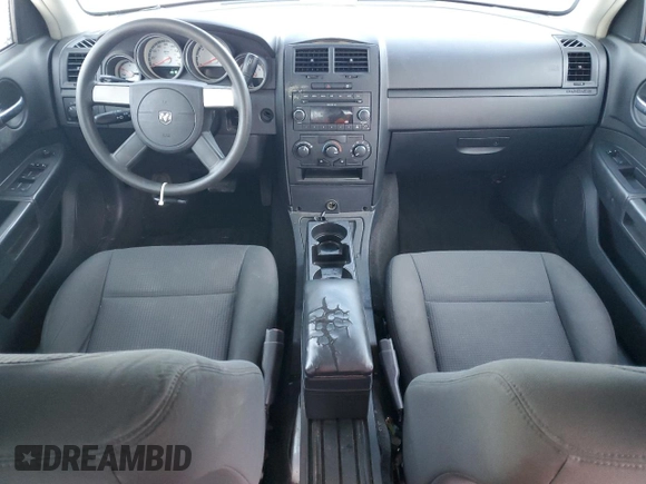 2009 Dodge Charger Police with VIN 2B3KA43TX9H587594, listed as a Copart auction lot 86266084 with 215,829 mi miles and Salvage Title. Bid and sale history available at DreamBid. Image 8.