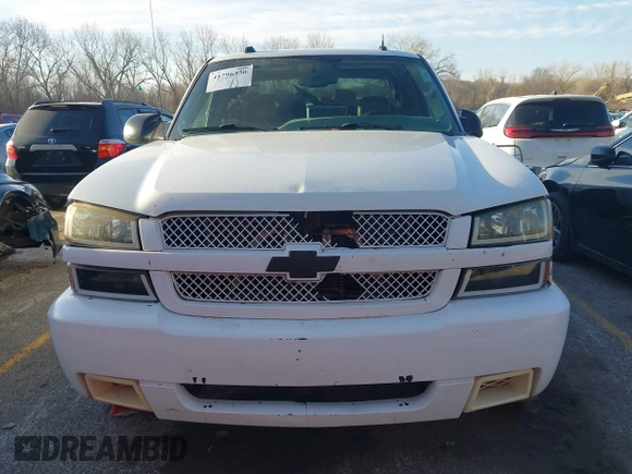 2004 Chevrolet Silverado 1500 Z71 with VIN 1GCEK19T94E401056, listed as a IAAI auction lot 41796330 with 301,264 mi miles and . Bid and sale history available at DreamBid. Image 6.
