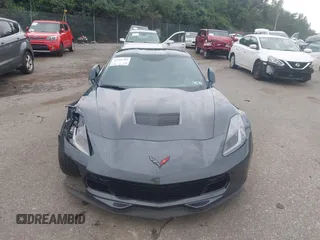 2019 Chevrolet Corvette Grand Sport 2LT with VIN 1G1YY2D7XK5117033, listed as a IAAI auction lot 42702384 with 11,994 mi miles and . Bid and sale history available at DreamBid. Image 12.