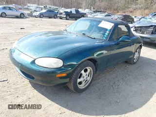 1999 Mazda MX-5 Miata with VIN JM1NB3537X0109618, listed as a IAAI auction lot 41795736 with 160,452 mi miles and . Bid and sale history available at DreamBid. Image 18.
