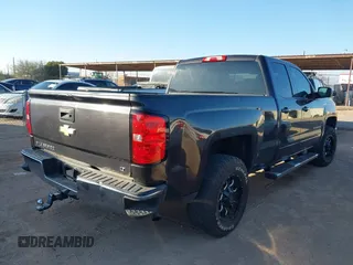 2015 Chevrolet Silverado 1500 LT with VIN 1GCRCREC1FZ308563, listed as a IAAI auction lot 41455858 with 162,196 mi miles. Bid and sale history available at carsss.com. Image 4.