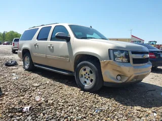 2012 Chevrolet Suburban LT with VIN 1GNSCJE03CR128206, listed as a IAAI auction lot 42002119 with 329,078 mi miles. Bid and sale history available at carsss.com. Image 1.
