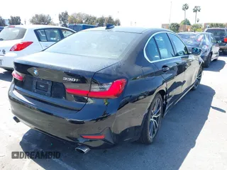 2019 BMW 3 Series 330i xDrive with VIN WBA5R7C5XKAJ78505, listed as a IAAI auction lot 41955059 with 53,216 mi miles. Bid and sale history available at carsss.com. Image 4.