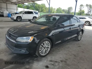 2012 Volkswagen Jetta SEL with VIN 3VWLX7AJ2CM409477, listed as a Copart auction lot 59476915 with 156,035 mi miles and Salvage title. Bid and sale history available at DreamBid. Image 1.
