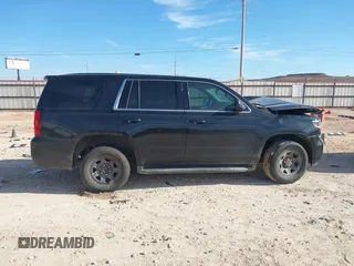 2019 Chevrolet Tahoe Commercial z VIN 1GNLCDEC4KR295348, wystawiony jako IAAI lot #41225134 z przebiegiem Nie podano mil oraz . Historia ofert i sprzedaży dostępna na DreamBid. Obrazek 13.