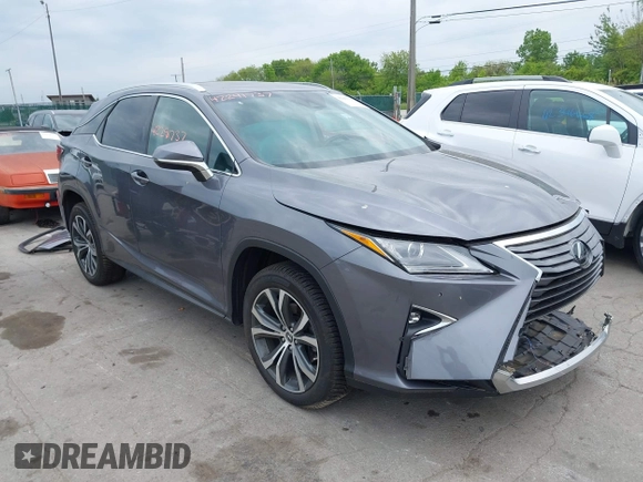 2018 Lexus RX 350 z VIN 2T2BZMCA0JC138411, wystawiony jako IAAI lot #42291737 z przebiegiem 58 725 mil mil oraz . Historia ofert i sprzedaży dostępna na DreamBid. Obrazek 1.