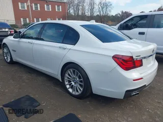 2015 BMW 7 Series 750Li xDrive with VIN WBAYF8C56FD654765, listed as a IAAI auction lot 40734550 with 133,848 mi miles and . Bid and sale history available at carsss.com. Image 3.