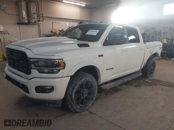 2022 Ram 2500 Laramie with VIN 3C6UR5FJ7NG253380, listed as a IAAI auction lot 41319536 with 33,945 mi miles. Bid and sale history available at carsss.com. Image 2.