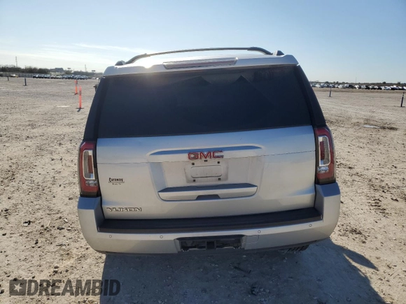 2015 GMC Yukon SLE with VIN 1GKS1AKC1FR716322, listed as a Copart auction lot 85992964 with 141,552 mi miles and Salvage Title. Bid and sale history available at carsss.com. Image 6.