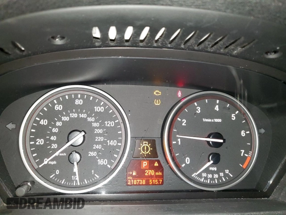 2011 BMW X5 35i z VIN 5UXZV4C52BL743475, wystawiony jako Copart lot #56238615 z przebiegiem 218 738 mil mil oraz Szkoda całkowita • Salvage title. Historia ofert i sprzedaży dostępna na DreamBid. Obrazek 9.