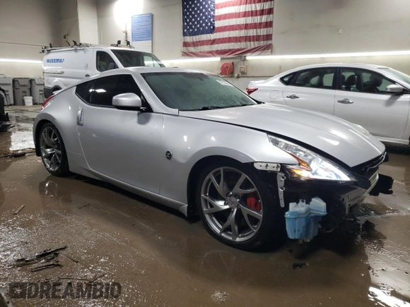 2014 Nissan 370Z Nismo with VIN JN1AZ4EH2EM636132, listed as a Copart auction lot 87218744 with 39,254 mi miles and Salvage Title. Bid and sale history available at DreamBid. Image 4.