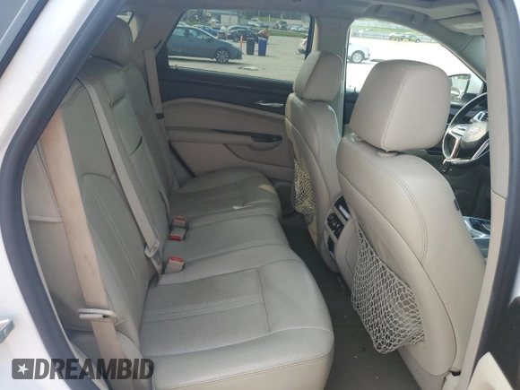 2013 Cadillac SRX Performance Collection with VIN 3GYFNDE30DS568330, listed as a Copart auction lot 59057005 with 163,817 mi miles and Salvage title. Bid and sale history available at DreamBid. Image 11.
