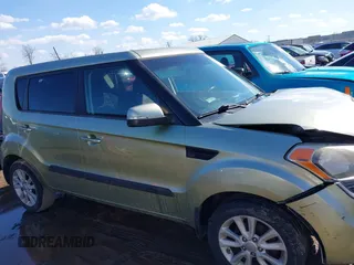2012 Kia Soul + with VIN KNDJT2A65C7403543, listed as a IAAI auction lot 41633273 with 128,988 mi miles. Bid and sale history available at carsss.com. Image 13.
