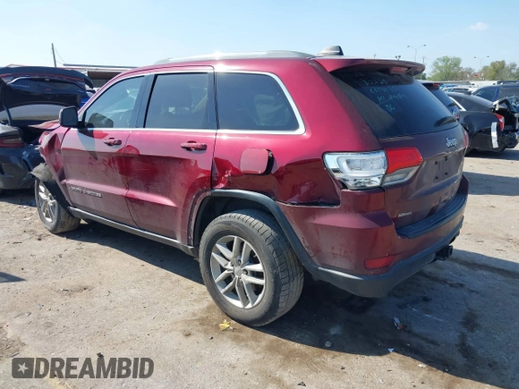 2017 Jeep Grand Cherokee Laredo with VIN 1C4RJEAG4HC674921, listed as a IAAI auction lot 41876971 with 115,773 mi miles. Bid and sale history available at carsss.com. Image 3.
