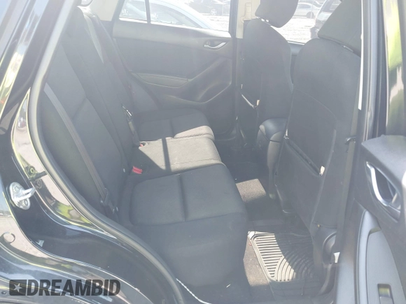 2014 Mazda CX-5 Sport z VIN JM3KE2BE2E0325715, wystawiony jako IAAI lot #42683243 z przebiegiem 262 005 mil mil oraz . Historia ofert i sprzedaży dostępna na DreamBid. Obrazek 8.