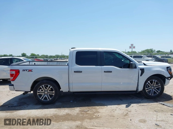 2023 Ford F-150 XL with VIN 1FTEW1CP5PKF42521, listed as a IAAI auction lot 42257062 with 30,758 mi miles and . Bid and sale history available at DreamBid. Image 13.