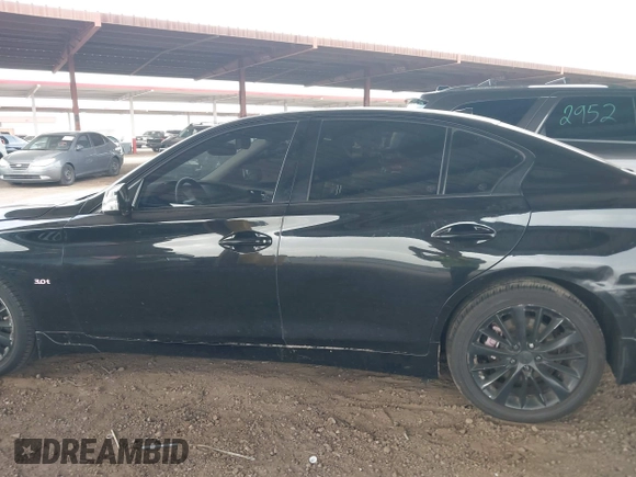 2019 Infiniti Q50 Luxe with VIN JN1EV7ARXKM593846, listed as a IAAI auction lot 42773548 with 57,165 mi miles and . Bid and sale history available at DreamBid. Image 14.