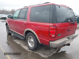 1999 Ford Expedition XLT z VIN 1FMPU18L6XLC38107, wystawiony jako IAAI lot #41779634 z przebiegiem 126 216 mil mil oraz . Historia ofert i sprzedaży dostępna na DreamBid. Obrazek 3.