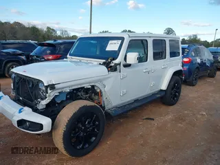 2021 Jeep Wrangler Unlimited Sahara with VIN 1C4JJXP64MW840094, listed as a IAAI auction lot 40830676 with 31,716 mi miles and . Bid and sale history available at DreamBid. Image 18.
