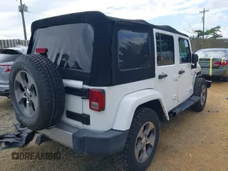 2018 Jeep Wrangler Unlimited Altitude with VIN 1C4HJWEGXJL870606, listed as a IAAI auction lot 42693031 with 92,735 mi miles and . Bid and sale history available at DreamBid. Image 4.