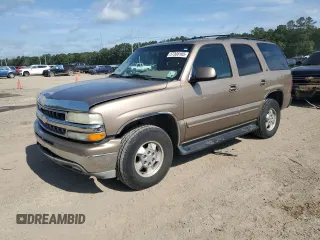 2003 Chevrolet Tahoe LS z VIN 1GNEC13Z03J104345, wystawiony jako Copart lot #57308165 z przebiegiem 142 954 mil mil oraz Szkoda całkowita • Salvage title. Historia ofert i sprzedaży dostępna na DreamBid. Obrazek 1.