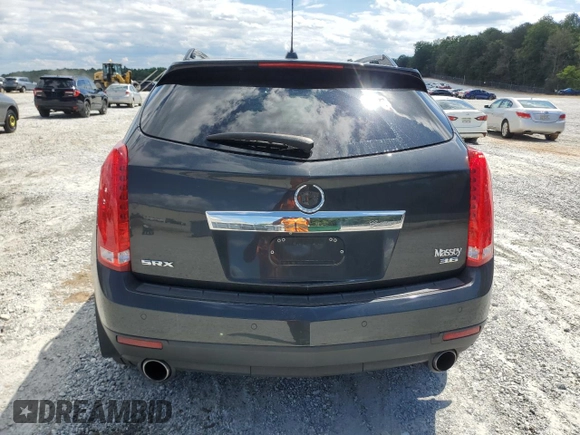 2015 Cadillac SRX Luxury Collection z VIN 3GYFNBE31FS598363, wystawiony jako Copart lot #55766975 z przebiegiem 62 103 mil mil oraz Szkody całkowita. Historia ofert i sprzedaży dostępna na DreamBid. Obrazek 6.
