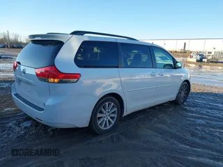 2012 Toyota Sienna XLE with VIN 5TDDK3DC4CS042464, listed as a IAAI auction lot 41199300 with 143,677 mi miles. Bid and sale history available at carsss.com. Image 4.