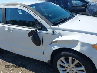 2011 Dodge Caliber Heat with VIN 1B3CB5HA6BD179014, listed as a IAAI auction lot 41704508 with 188,127 mi miles and . Bid and sale history available at DreamBid. Image 6.