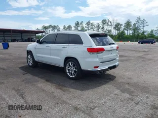 2014 Jeep Grand Cherokee Summit with VIN 1C4RJFJT6EC281114, listed as a IAAI auction lot 42497582 with 128,181 mi miles and . Bid and sale history available at DreamBid. Image 3.