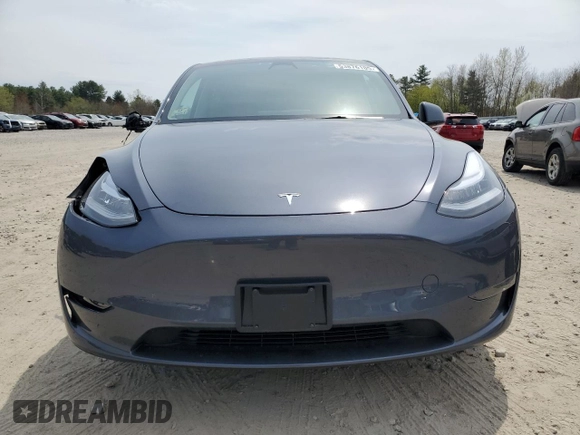 2023 Tesla Model Y Long Range with VIN 7SAYGDEE7PA031199, listed as a Copart auction lot 53876105 with 10,835 mi miles and Salvage Title. Bid and sale history available at DreamBid. Image 5.