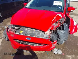 2015 Ford Focus SE z VIN 1FADP3F24FL283927, wystawiony jako IAAI lot #41755250 z przebiegiem Nie podano mil oraz . Historia ofert i sprzedaży dostępna na DreamBid. Obrazek 6.