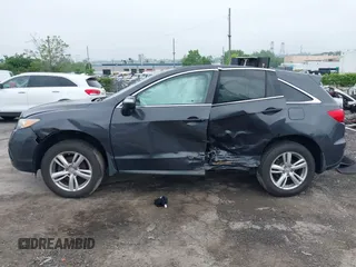2014 Acura RDX z VIN 5J8TB4H38EL018444, wystawiony jako IAAI lot #42288992 z przebiegiem Nie podano mil oraz . Historia ofert i sprzedaży dostępna na DreamBid. Obrazek 13.