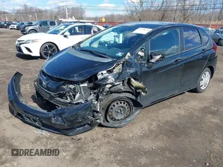 2015 Honda Fit LX z VIN 3HGGK5H51FM775176, wystawiony jako IAAI lot #41690648 z przebiegiem 49 979 mil mil oraz . Historia ofert i sprzedaży dostępna na DreamBid. Obrazek 20.