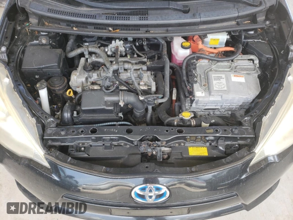 2012 Toyota Prius One z VIN JTDKDTB30C1504892, wystawiony jako Copart lot #60348625 z przebiegiem 85 880 mil mil oraz Czysty tytuł • Clean title. Historia ofert i sprzedaży dostępna na DreamBid. Obrazek 11.