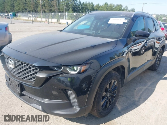 2025 Mazda CX-50 S Preferred with VIN 7MMVABBM9SN301063, listed as a IAAI auction lot 42801040 with 23,696 mi miles and . Bid and sale history available at DreamBid. Image 2.
