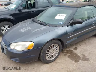 2002 Chrysler Sebring Limited with VIN 1C3EL65R72N201668, listed as a IAAI auction lot 41018612 with 143,931 mi miles. Bid and sale history available at carsss.com. Image 6.