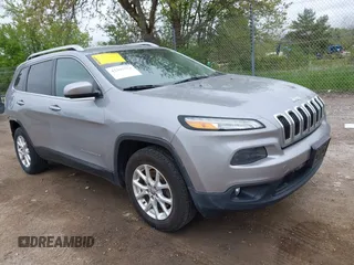 2014 Jeep Cherokee Latitude z VIN 1C4PJMCB8EW247156, wystawiony jako IAAI lot #42307754 z przebiegiem 147 110 mil mil oraz . Historia ofert i sprzedaży dostępna na DreamBid. Obrazek 1.