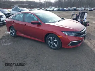 2020 Honda Civic Sedan LX with VIN 2HGFC2F64LH563546, listed as a IAAI auction lot 41610548 with 35,876 mi miles. Bid and sale history available at carsss.com. Image 1.