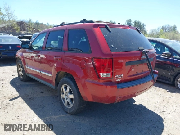 2009 Jeep Grand Cherokee Laredo with VIN 1J8GR48K79C543304, listed as a IAAI auction lot 42151011 with 157,679 mi miles. Bid and sale history available at carsss.com. Image 3.