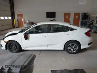 2016 Honda Civic Sedan LX with VIN 19XFC2F59GE028056, listed as a IAAI auction lot 41875940 with 124,243 mi miles. Bid and sale history available at carsss.com. Image 14.
