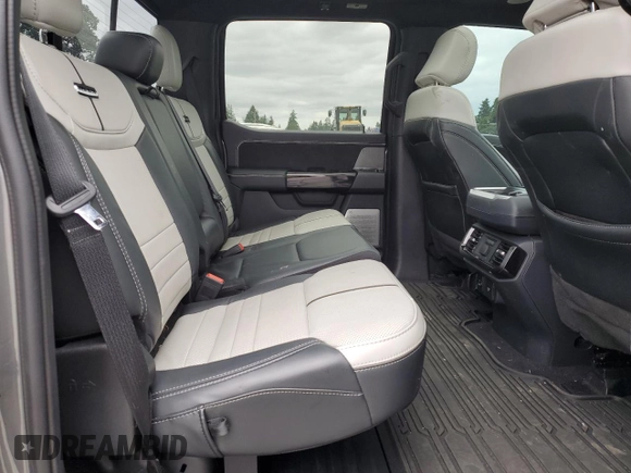 2023 Ford F-150 Lightning Pro with VIN 1FT6W1EV9PWG25278, listed as a Copart auction lot 60293095 with 24,450 mi miles and Salvage title. Bid and sale history available at DreamBid. Image 10.