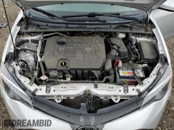 2019 Toyota Corolla L z VIN 5YFBURHE8KP898714, wystawiony jako Copart lot #56707395 z przebiegiem 86 665 mil mil oraz Szkoda całkowita • Salvage title. Historia ofert i sprzedaży dostępna na DreamBid. Obrazek 11.