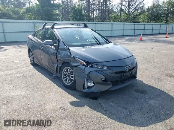 2021 Toyota Prius LE with VIN JTDKAMFP3M3166034, listed as a Copart auction lot 63271275 with 52,536 mi miles and Salvage title. Bid and sale history available at DreamBid. Image 13.