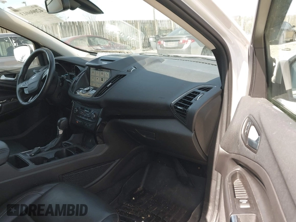 2017 Ford Escape Titanium with VIN 1FMCU9J96HUE21191, listed as a IAAI auction lot 42006013 with 71,786 mi miles. Bid and sale history available at carsss.com. Image 5.