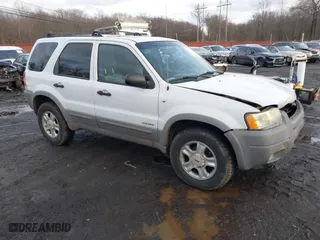 2002 Ford Escape XLT Choice with VIN 1FMYU04142KD82594, listed as a IAAI auction lot 41574646 with 173,174 mi miles. Bid and sale history available at carsss.com. Image 1.